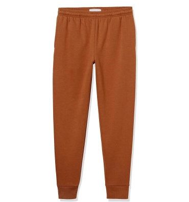 Rust-orange custom joggers with elastic waistband and cuffed ankles