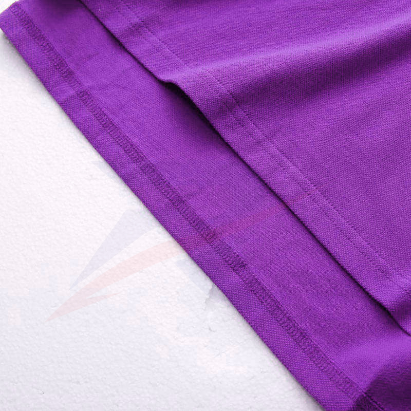 Close-up of custom polo shirt fabric and hem stitching