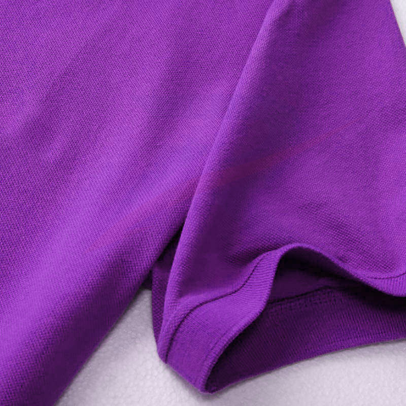 Close-up of polo shirt sleeve cuff and piqué fabric