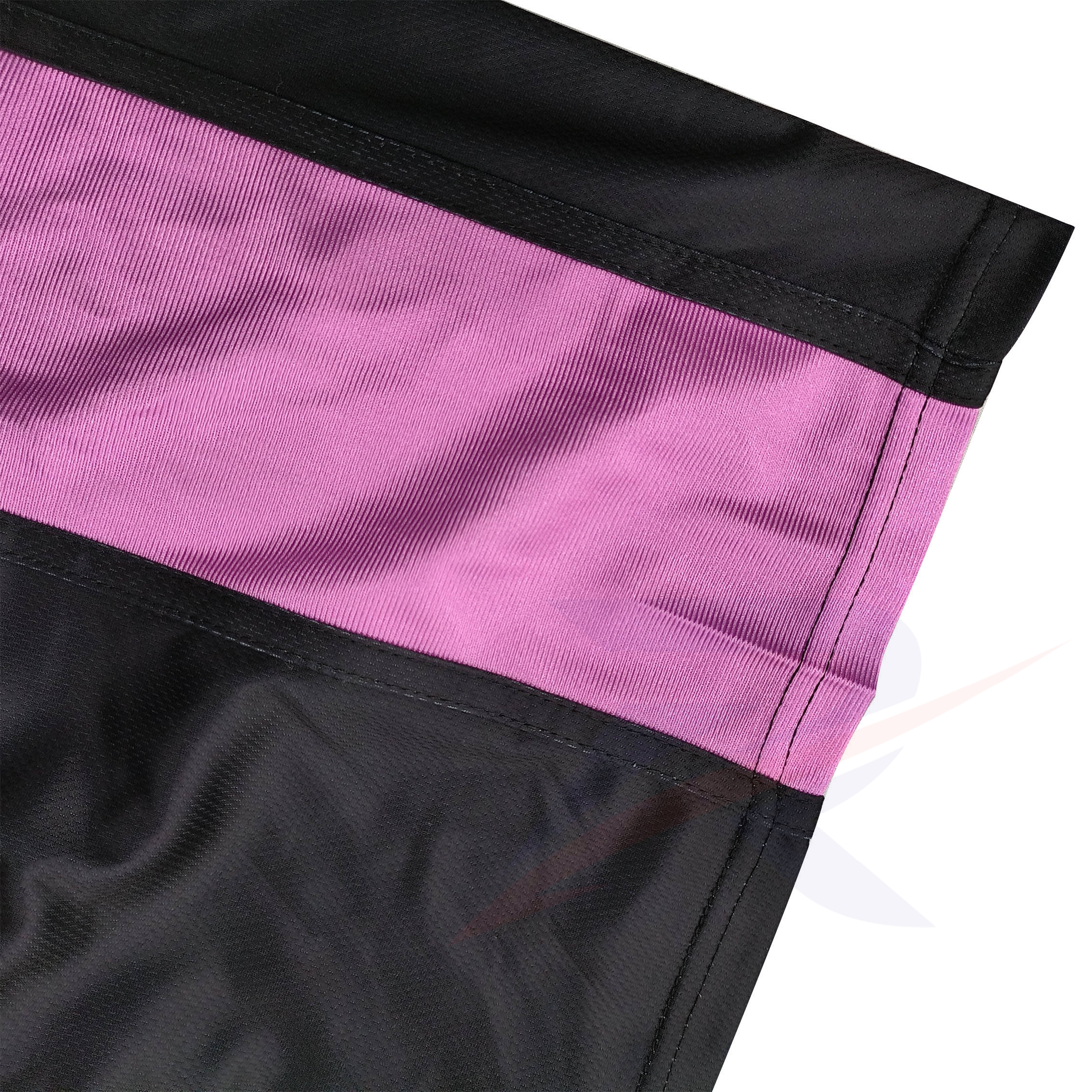 Close-up of black mesh and pink contrast panel