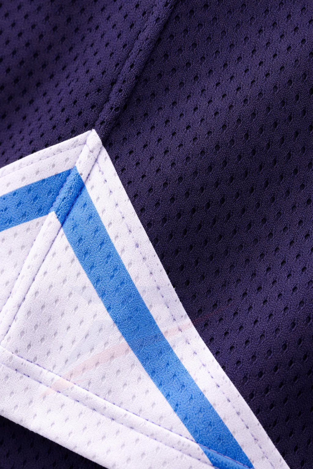 Close-up of sublimated mesh fabric and side panel trim
