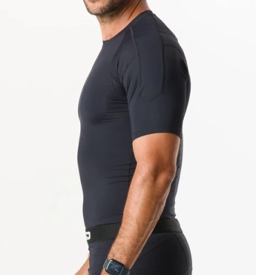 Black custom compression shirt with short sleeves and flatlock seams, worn by an athlete